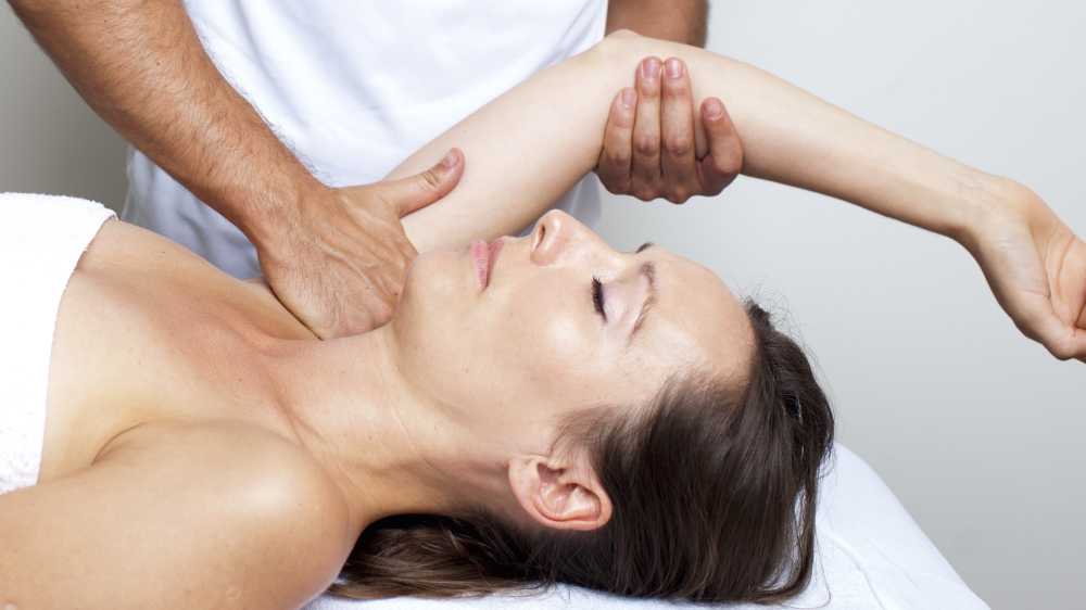 hands on osteopathic shoulder treatment